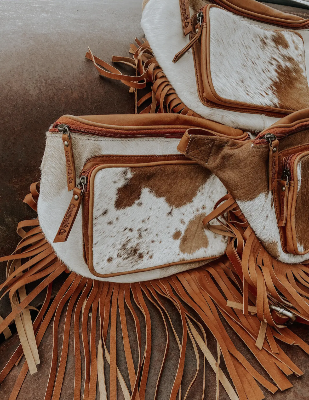 Cowhide Checkered Fringe Sling Festival Fanny Pack